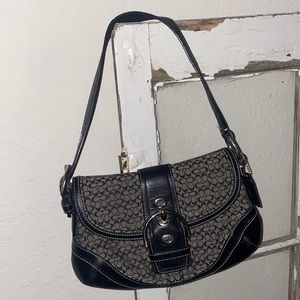 Black Coach purse with leather & buckle strap! 🖤